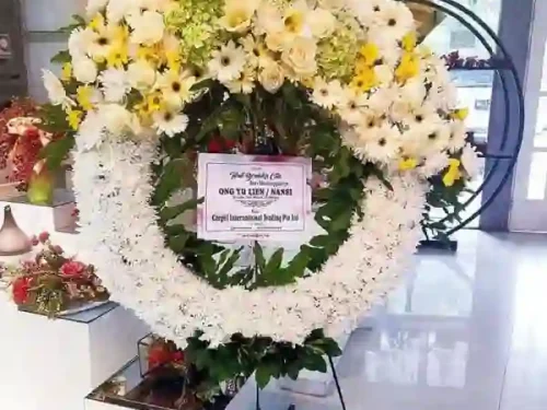 standing-flower-dukacita-bulat Krans Bunga Duka